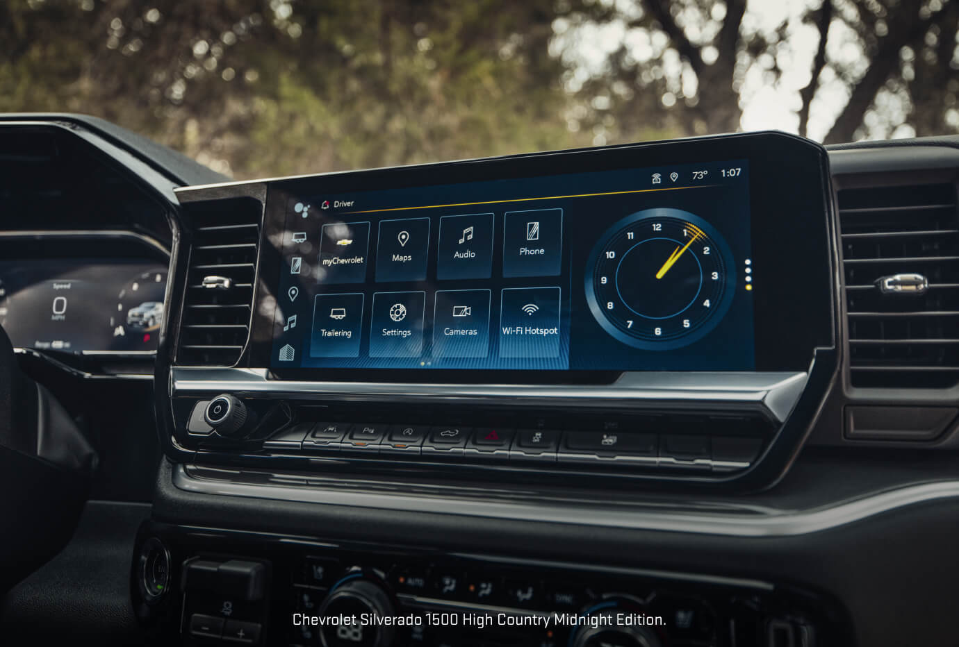 Close-up dashboard view of a 2026 Chevrolet Silverado 1500 High Country Midnight Edition showcasing the touchscreen system.